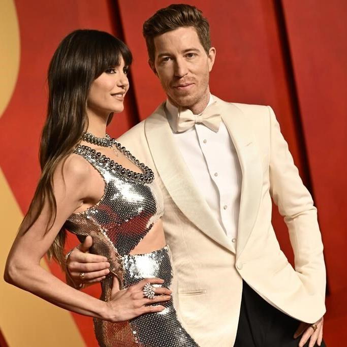 Shaun White and Nina Dobrev are engaged. He faked a dinner invite with Anna Wintour to propose